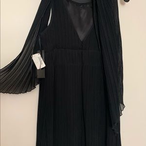 Fun and flouncy black cocktail dress.